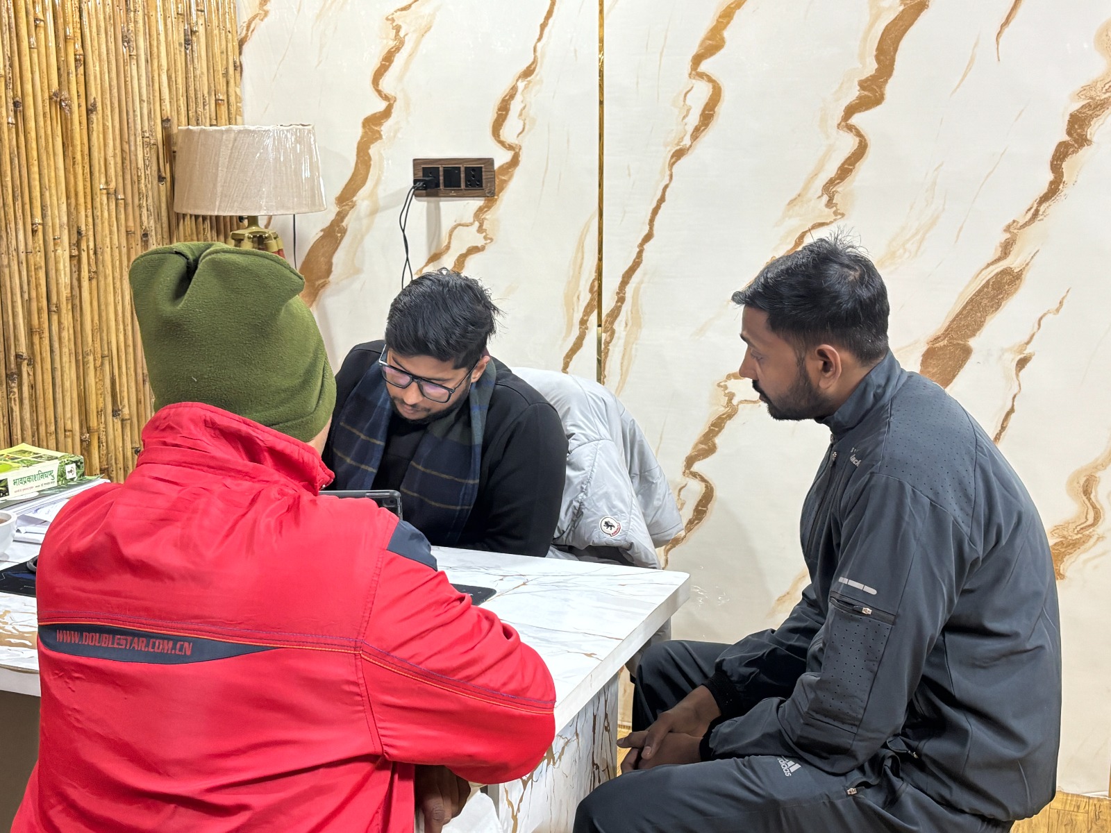 Vibrant crimson rose in a dew-dropped garden at sunrise with soft golden light filtering through petals